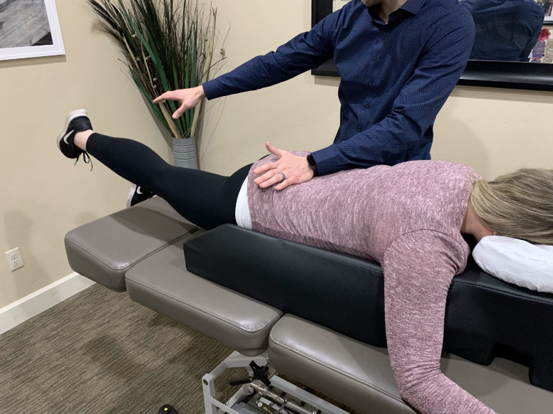 Client does stretches to see where the most pain is