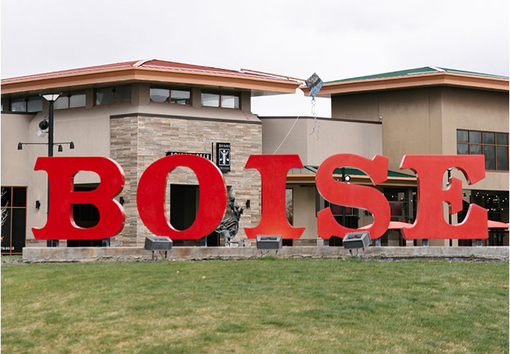 A sign with red lettering reading 'Boise'